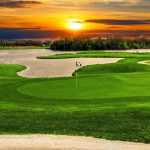 Panoramic view of a lush green golf course at Fox Hollow Golf Club and Restaurant. Smooth