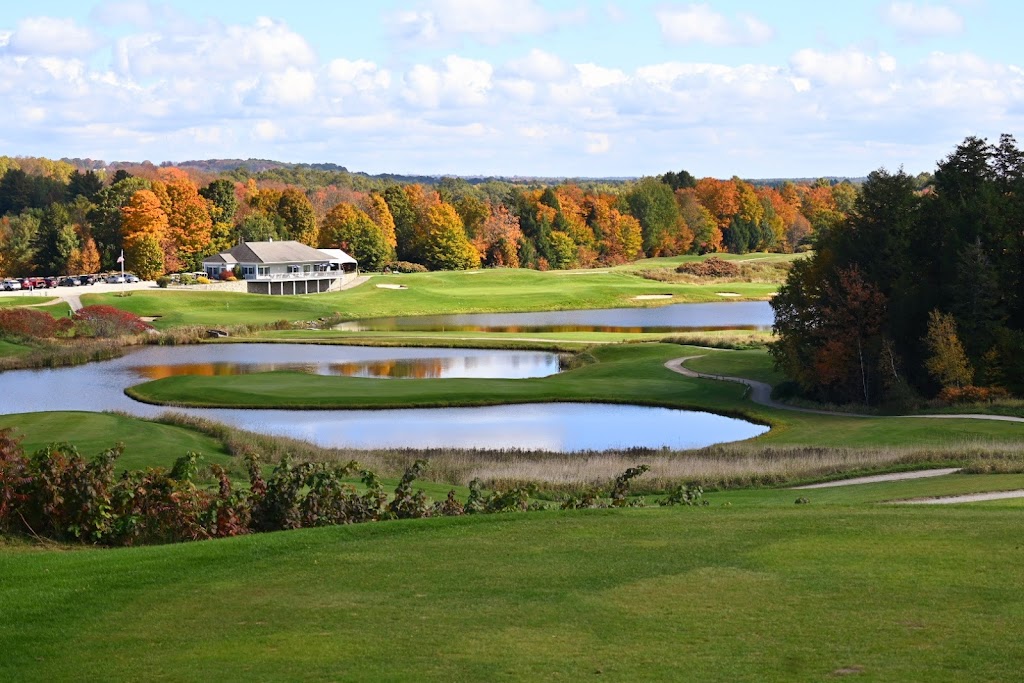 Panoramic view of a lush green golf course at Fox Ridge Golf Club. Smooth