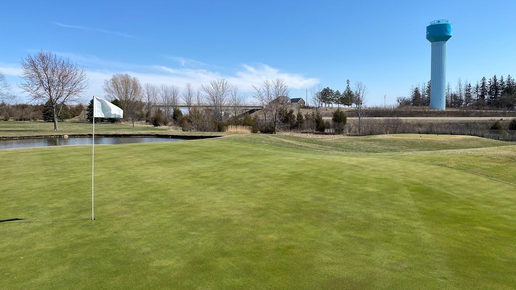 Panoramic view of a lush green golf course at Fox Ridge Public Golf Course. Smooth