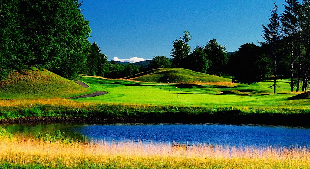 Panoramic view of a lush green golf course at Fox Run Golf Club. Smooth