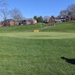 Panoramic view of a lush green golf course at Frankfort Country Club. Smooth