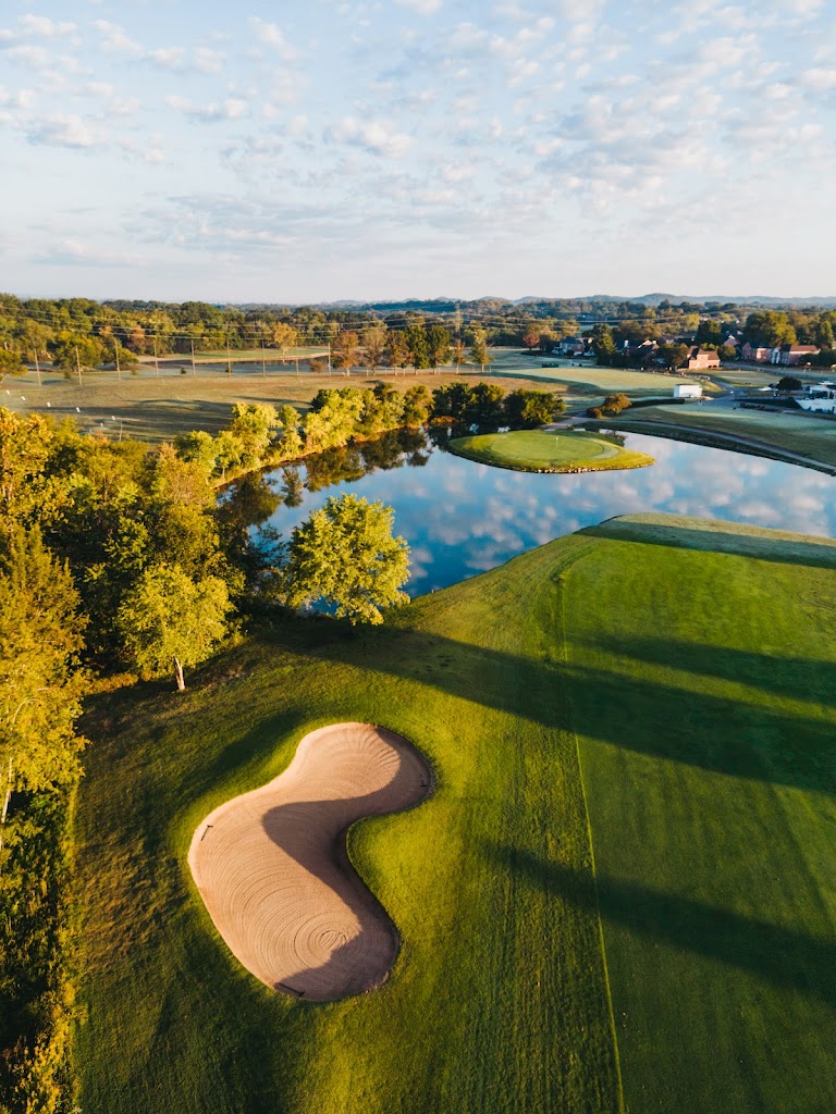 Panoramic view of a lush green golf course at Franklin Bridge Golf Club. Smooth