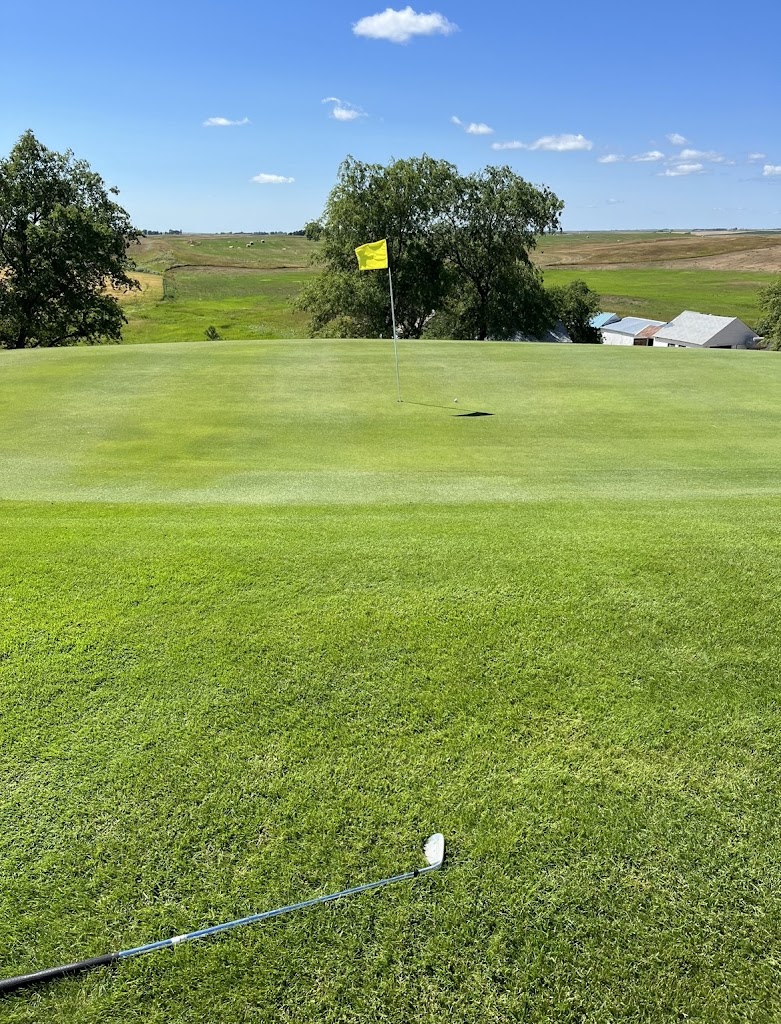 Panoramic view of a lush green golf course at Gackle Country Club. Smooth