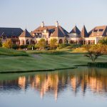 Panoramic view of a lush green golf course at Gaillardia Country Club. Smooth