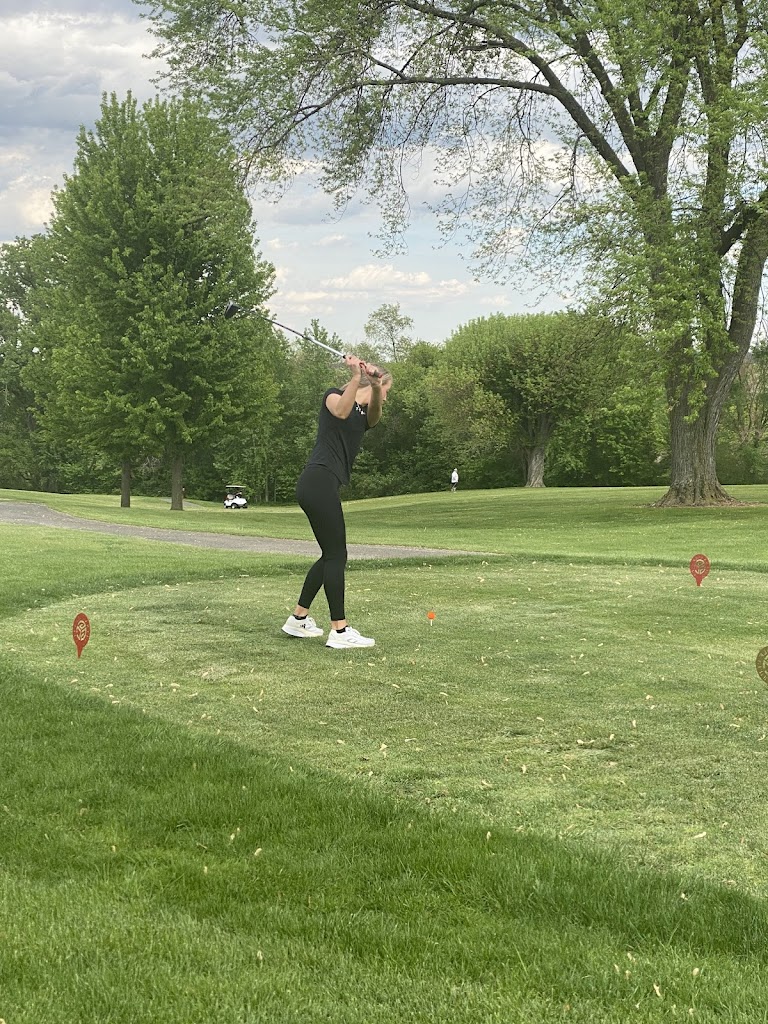 Panoramic view of a lush green golf course at Galena Golf Club. Smooth