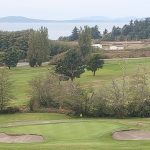 Panoramic view of a lush green golf course at Gallery Golf Course. Smooth