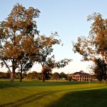 Panoramic view of a lush green golf course at Gateway Golf Course. Smooth