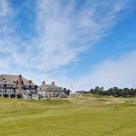 Panoramic view of a lush green golf course at Gearhart Golf Links. Smooth