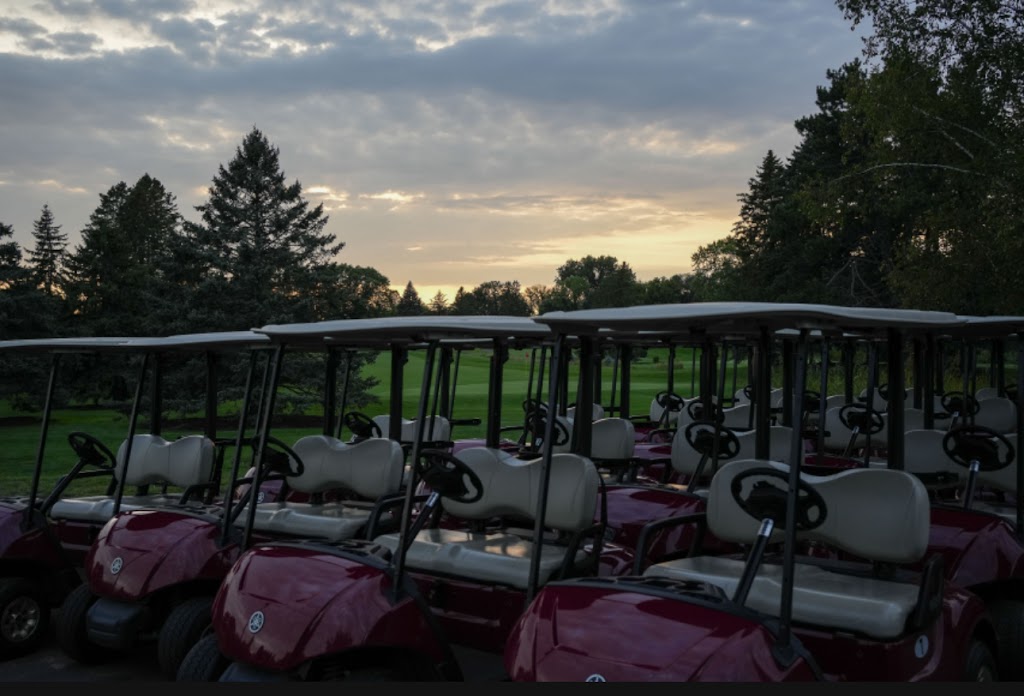 Panoramic view of a lush green golf course at Gem Lake Hills Golf Course. Smooth