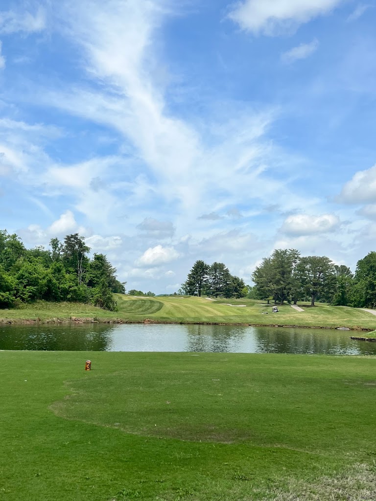 Panoramic view of a lush green golf course at General Burnside Island Golf. Smooth