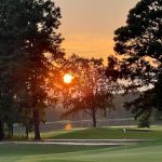 Panoramic view of a lush green golf course at Georgia Southern University Golf Course. Smooth