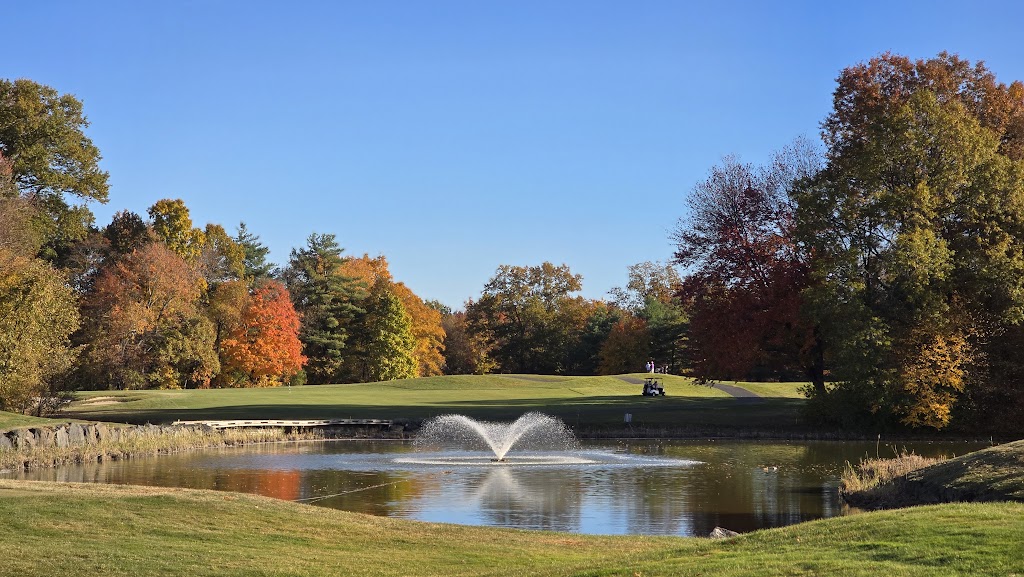 Panoramic view of a lush green golf course at Gillette Ridge Golf Club. Smooth