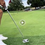 green grass with the flag in the hole.