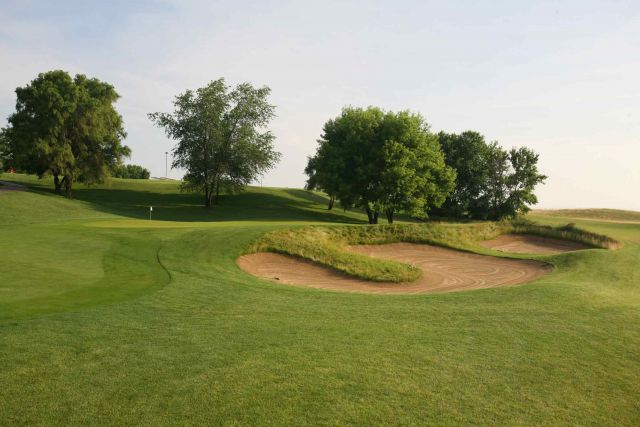 Panoramic view of a lush green golf course at Glen Erin Golf Club. Smooth