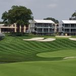 green grass with the flag in the hole.