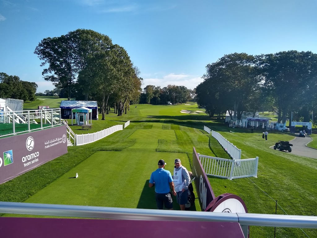 Panoramic view of a lush green golf course at Glen Oaks Club. Smooth