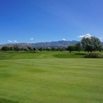 Panoramic view of a lush green golf course at Glendale Golf Course. Smooth