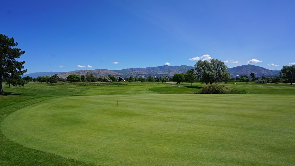 Panoramic view of a lush green golf course at Glendale Golf Course. Smooth