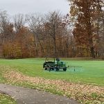 green grass with the flag in the hole.