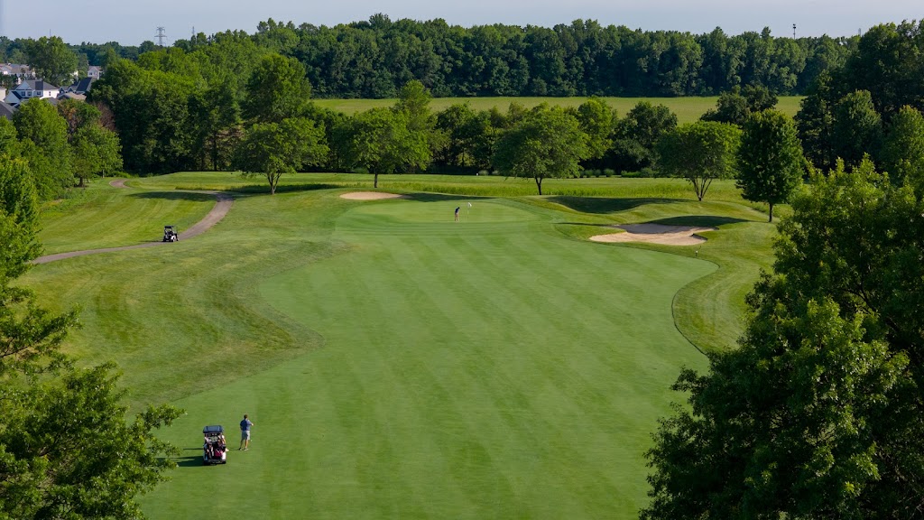 Panoramic view of a lush green golf course at Glenross Golf Club. Smooth