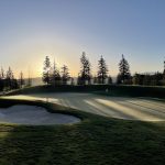 Panoramic view of a lush green golf course at Glenwild Golf Club and Spa. Smooth