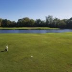 Panoramic view of a lush green golf course at Glenwoodie Golf Club. Smooth