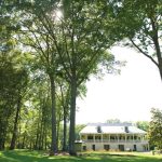 Panoramic view of a lush green golf course at Golden Eagle Golf Club. Smooth