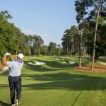 Panoramic view of a lush green golf course at Golden Horseshoe Golf Club. Smooth