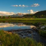 Panoramic view of a lush green golf course at Golf at River Valley Ranch | Carbondale Golf Course. Smooth