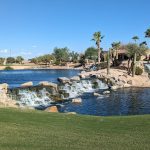 Panoramic view of a lush green golf course at Granite Falls Golf Club. Smooth
