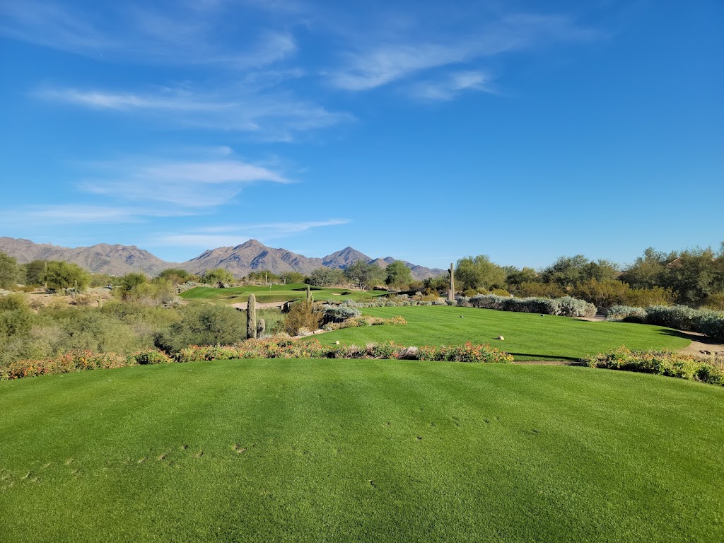 Panoramic view of a lush green golf course at Grayhawk Golf Club. Smooth