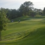 Panoramic view of a lush green golf course at Grayslake Golf Course. Smooth