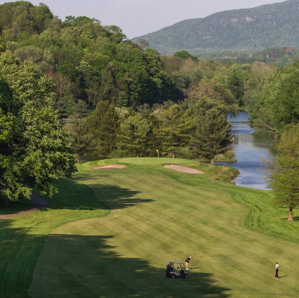 Panoramic view of a lush green golf course at Great Gorge Golf Club. Smooth