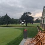 green grass with the flag in the hole.