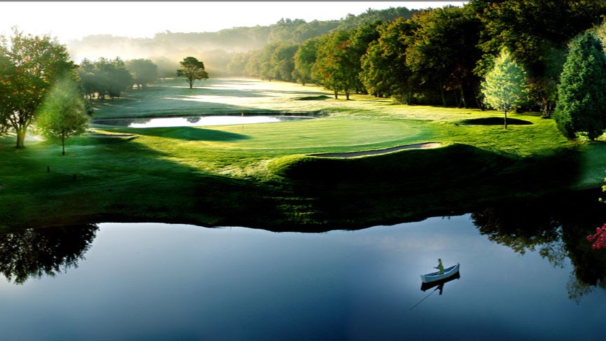 Panoramic view of a lush green golf course at Green Harbor Golf Club. Smooth