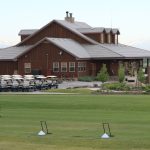 Panoramic view of a lush green golf course at Green Valley Ranch Golf Club. Smooth