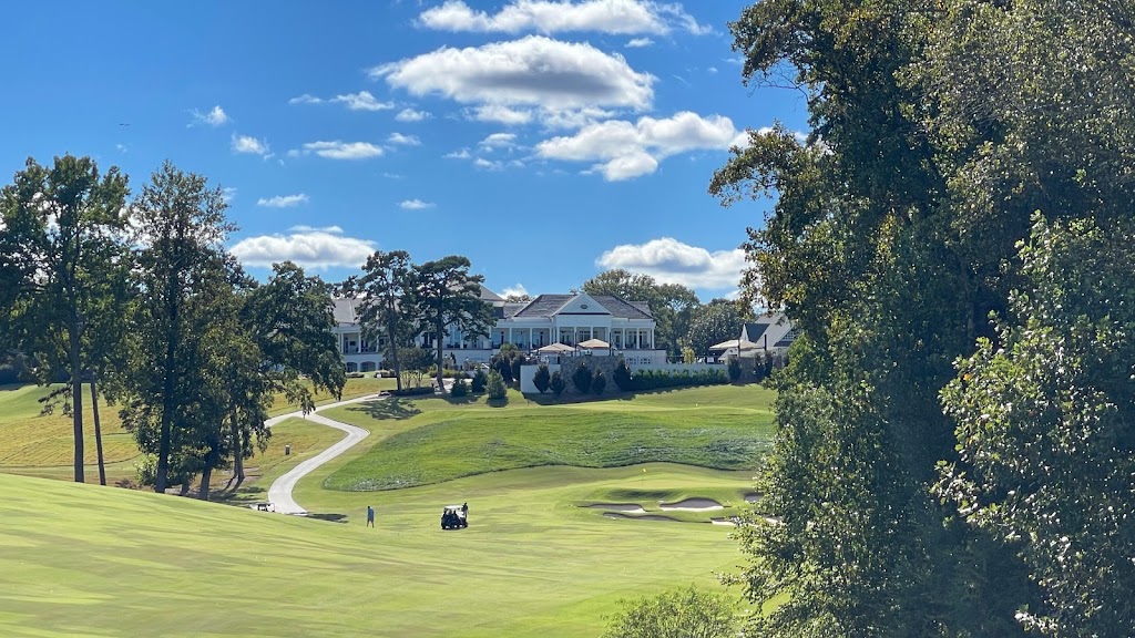Panoramic view of a lush green golf course at Greenville Country Club Chanticleer Course. Smooth