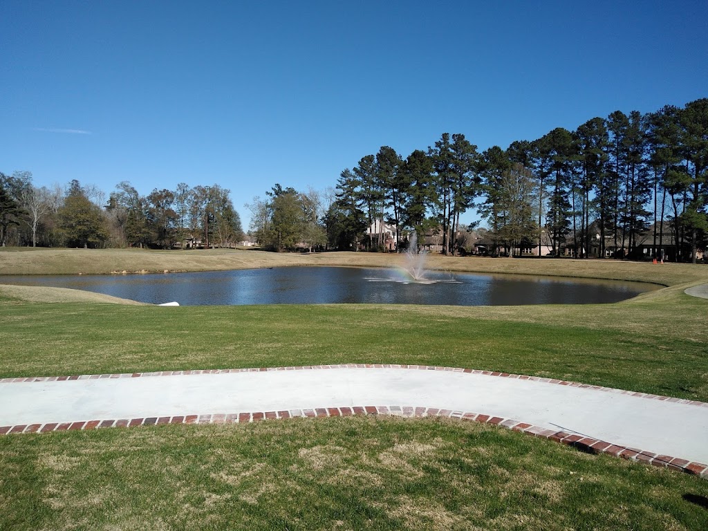 Panoramic view of a lush green golf course at Greystone Country Club. Smooth