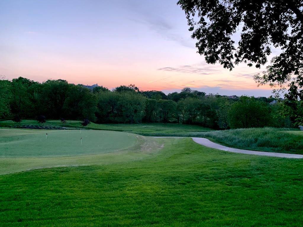 Panoramic view of a lush green golf course at Hallbrook Country Club. Smooth