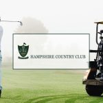 Panoramic view of a lush green golf course at Hampshire Country Club. Smooth