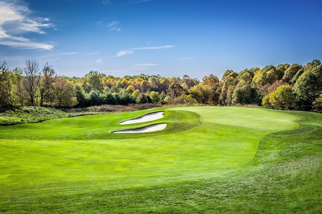 Panoramic view of a lush green golf course at Hampshire Greens Golf Course. Smooth