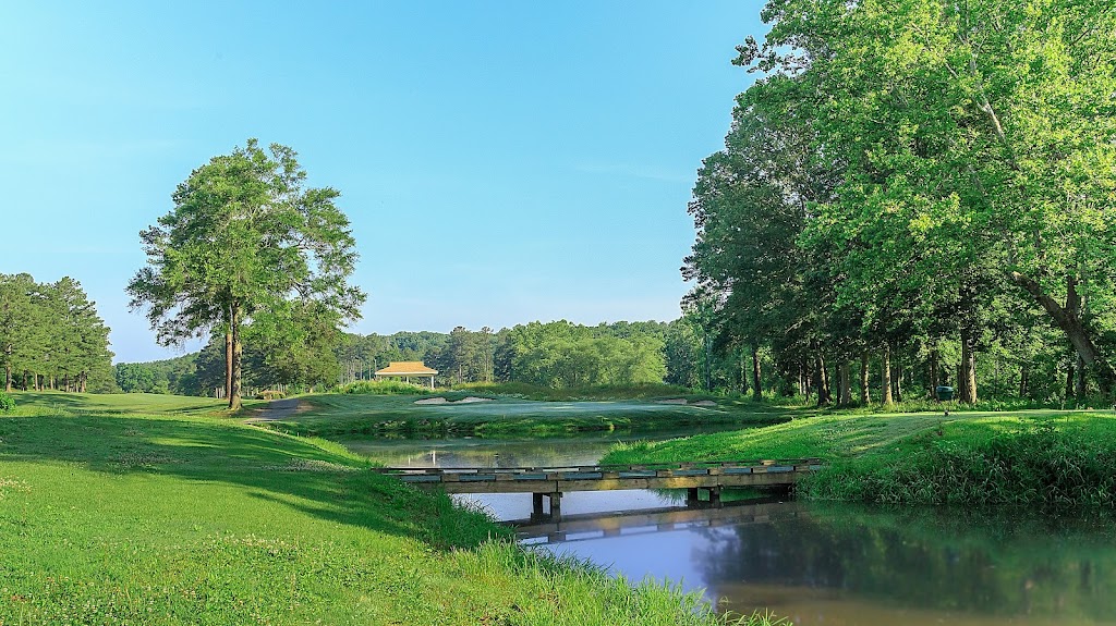 Panoramic view of a lush green golf course at Hanover Golf Club. Smooth