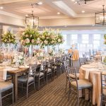 Panoramic view of a lush green golf course at Harbor Lights Dining Events Golf Marina. Smooth