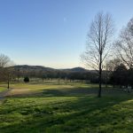 Panoramic view of a lush green golf course at Harpeth Hills Golf Course. Smooth