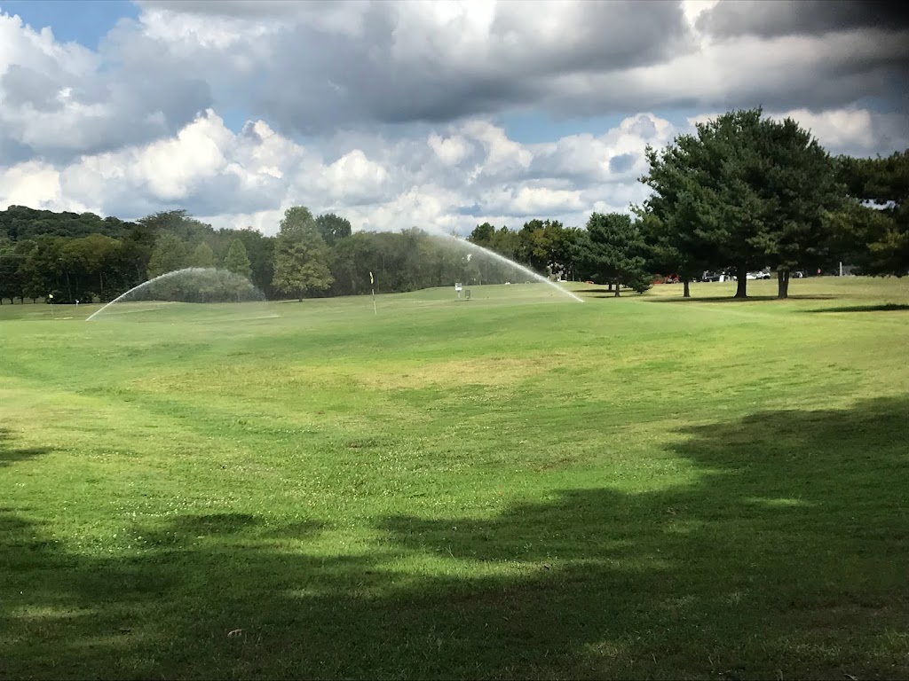 Panoramic view of a lush green golf course at Harpeth Valley Golf Center. Smooth