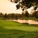 Panoramic view of a lush green golf course at Harrison Hills Golf Club. Smooth