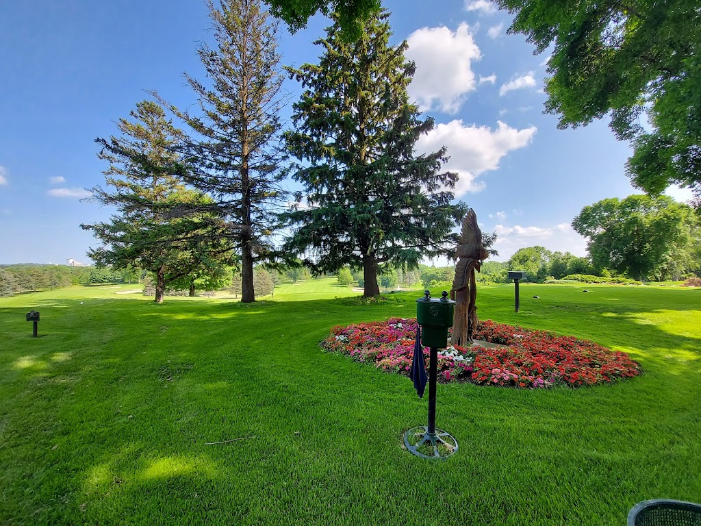 Panoramic view of a lush green golf course at Hastings Golf Club & Events. Smooth