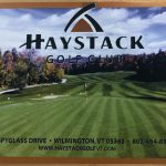 Panoramic view of a lush green golf course at Haystack Golf Course. Smooth