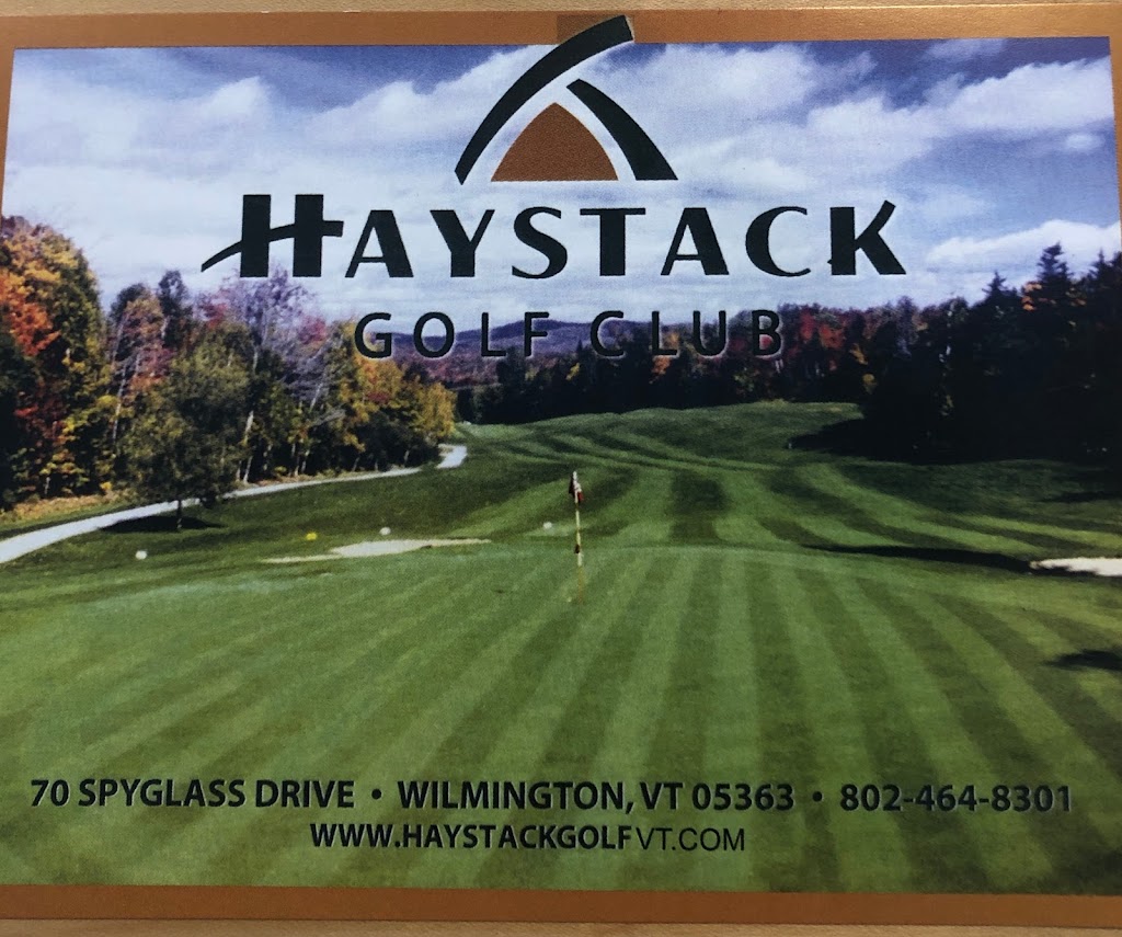 Panoramic view of a lush green golf course at Haystack Golf Course. Smooth