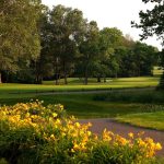 Panoramic view of a lush green golf course at Heatherwoode Golf Club. Smooth